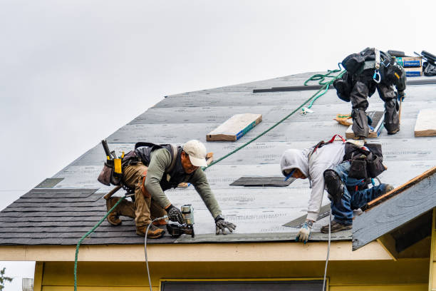 Professional Gutter Installation technician working in Seekonk, MA